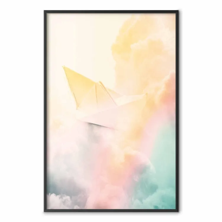 Origami - navire en papier dans les nuages colorés