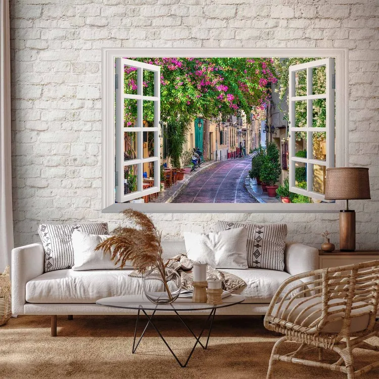 Toscane - vue sur une rue toscane avec des fleurs colorées