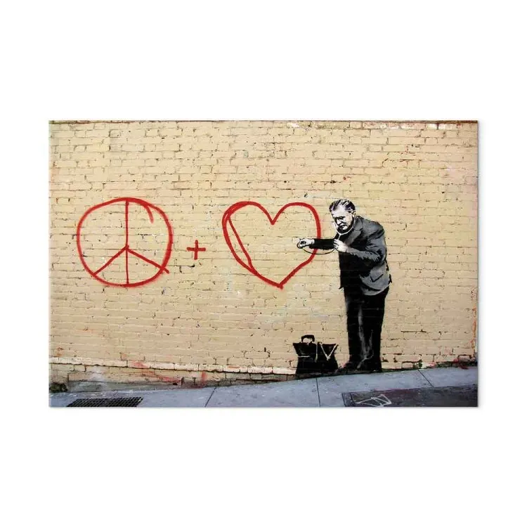 Médecin pacifiste (Banksy) - street art homme sur mur de brique