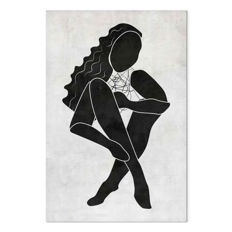 Femme assise - une silhouette noire d'une femme sur fond gris