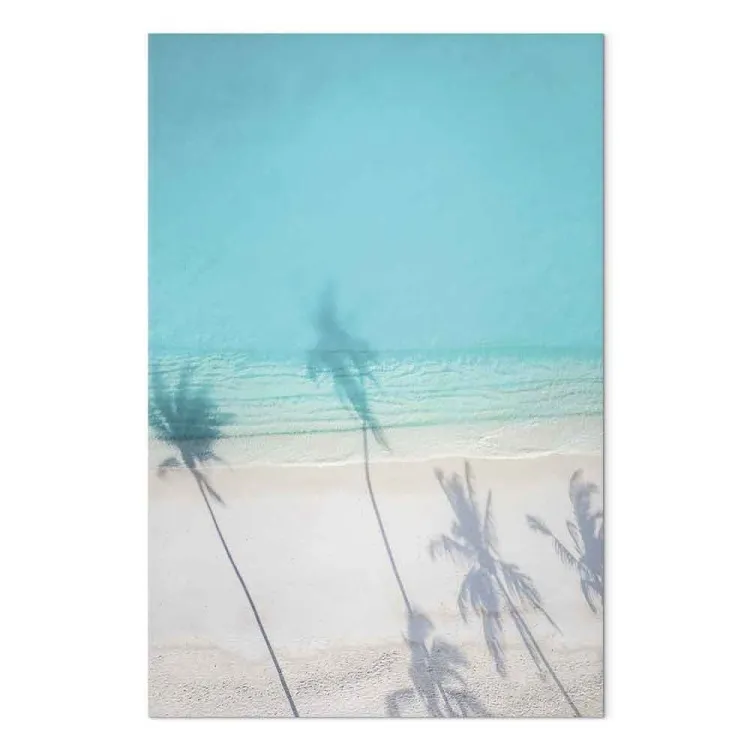 Côte turquoise - le plage sablonneuse ombragée de palmiers