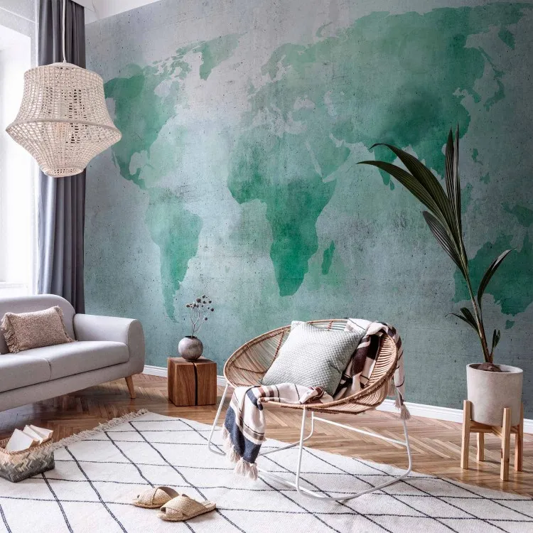 Monde menthe - carte du monde à l'aquarelle sur fond de béton