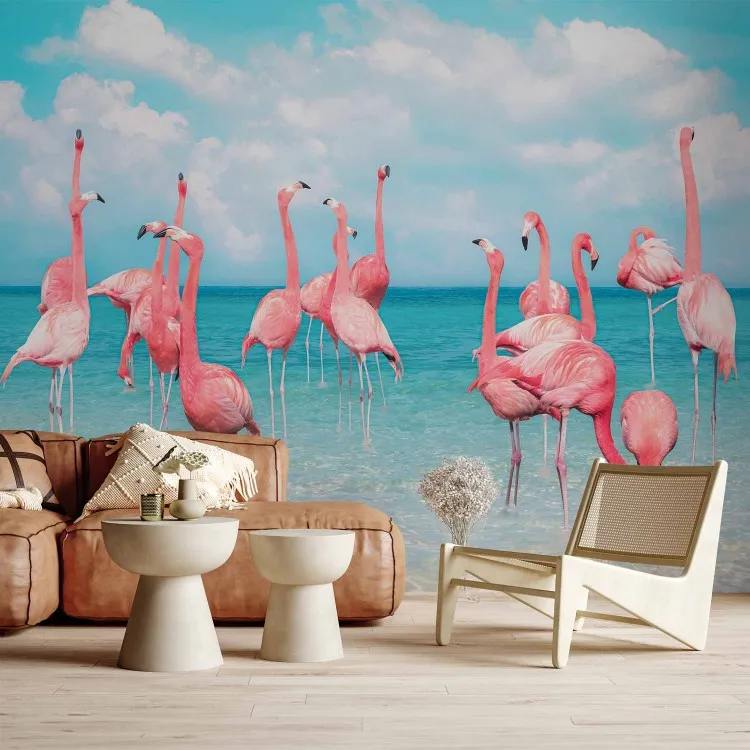 Troupeau de flamants roses - oiseaux roses dans une eau cristalline