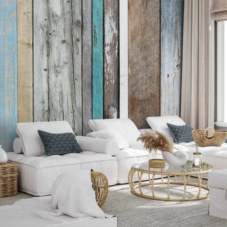 Clôture - planches en bois colorées dans différentes teintes de gris