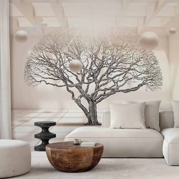 Paysage géométrique - arbre sans feuilles dans un espace beige